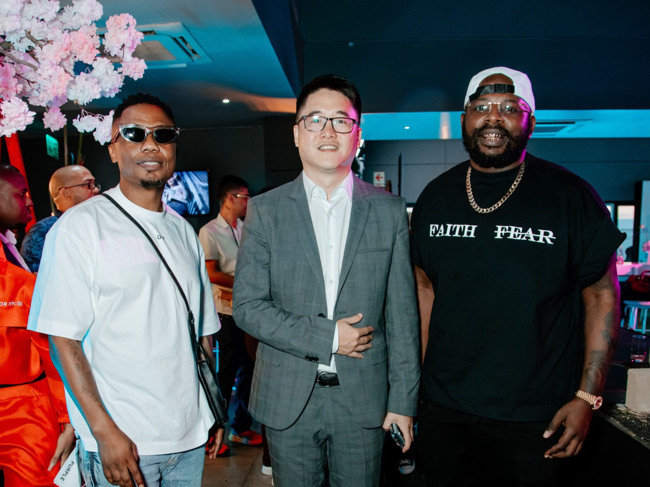 DJs Tira and Maphorisa flanking Fred Zhou, GM at HONOR, at the launch of the X9c 5G in Sandton